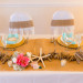 Rustic Tablescape with Blue Mason Jars, Coral Carnations and Burlap Runner at Palm Beach Shores Community Center in Palm Beach, FL thumbnail