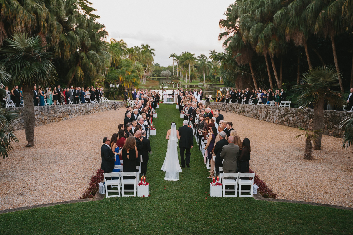 Elegant Wedding Ceremony in the Bailey Palm Glade | The Majestic Vision Wedding Planning | Fairchild Tropical Garden in Coral Gables, FL | www.themajesticvision.com | Robert Madrid Photography
