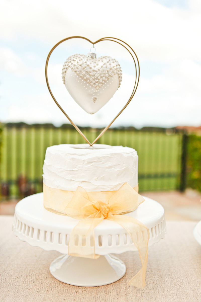 Simple White Buttercream Wedding Cake | The Majestic Vision Wedding Planning | International Polo Club in Palm Beach, FL | www.themajesticvision.com | Krystal Zaskey Photography