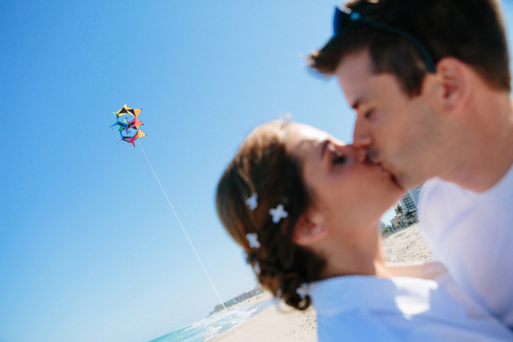 Fun Bridal Portrait on the Beach while Flying a Kite | The Majestic Vision Wedding Planning | Marriott Singer Island in Palm Beach, FL | www.themajesticvision.com | Robert Madrid Photography