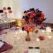 Elegant Centerpiece with Purple Roses, Coral Roses and Calla Lillies at Sailfish Marina in Palm Beach, FL thumbnail