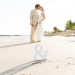 Stunning Bridal Portrait on the Beach at Sailfish Marina in Palm Beach, FL thumbnail