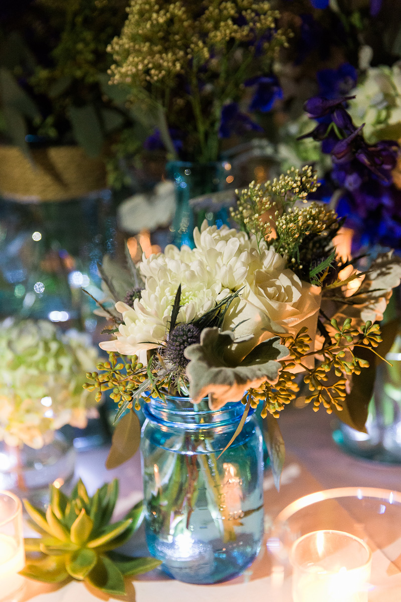 Elegant Centerpiece with Wildflowers, Blue Hydrangea and Cream Roses | The Majestic Vision Wedding Planning | Sailfish Marina in Palm Beach, FL | www.themajesticvision.com | Chris Kruger Photography