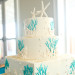Whimsical Wedding Cake with Coral and Starfish at Palm Beach Shore in Palm Beach, FL thumbnail