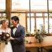 Stunning Bride in Mikaella Gown with Elegant Marsala Bridal Bouquet with Roses and Dahlias at Anodyne Coffee in Milwaukee, WI thumbnail