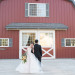 Beautiful Bride in Blush Tara Keely Gown With Handsome Groom in Front of Barn at Rustic Manor in Milwaukee, WI thumbnail