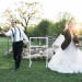 Bride and Groom Playing Fun Lawn Games During Cocktail Hour at Rustic Manor in Milwaukee, WI thumbnail