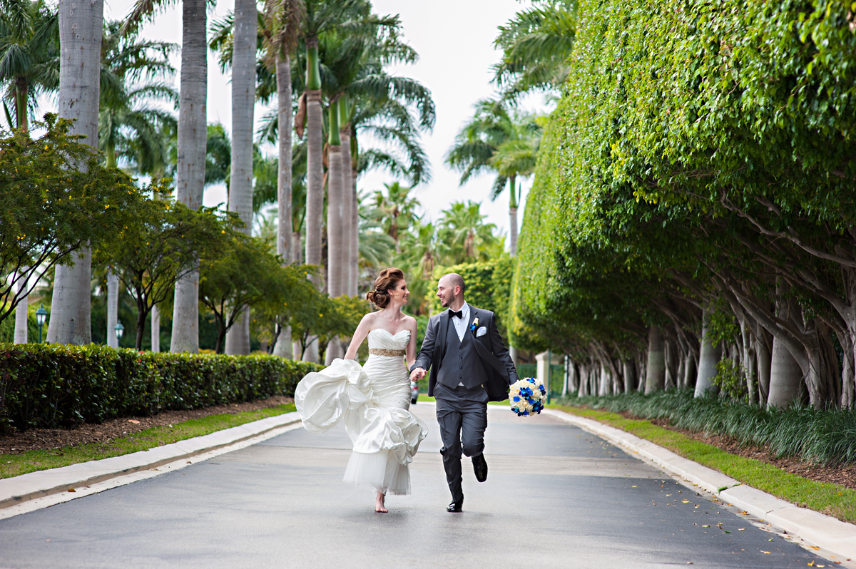 Elegant Running Couple Portrait | The Majestic Vision Wedding Planning | Grand Bay Club in Key Biscayne, FL | www.themajesticvision.com | Emindee Images
