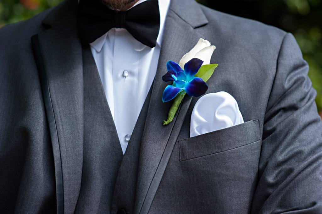 Elegant Blue Orchid and White Rose Groom Boutineer | The Majestic Vision Wedding Planning | Grand Bay Club in Key Biscayne, FL | www.themajesticvision.com | Emindee Images