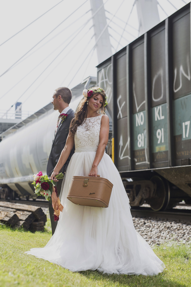 Romantic Couple Portrait with Train Car | The Majestic Vision Wedding Planning | Iron Horse Hotel in Milwaukee, WI | www.themajesticvision.com | Shannon Wucherer Photography