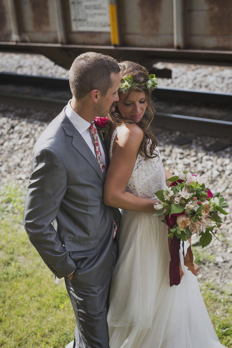 Romantic Couple Portrait with Train Car | The Majestic Vision Wedding Planning | Iron Horse Hotel in Milwaukee, WI | www.themajesticvision.com | Shannon Wucherer Photography