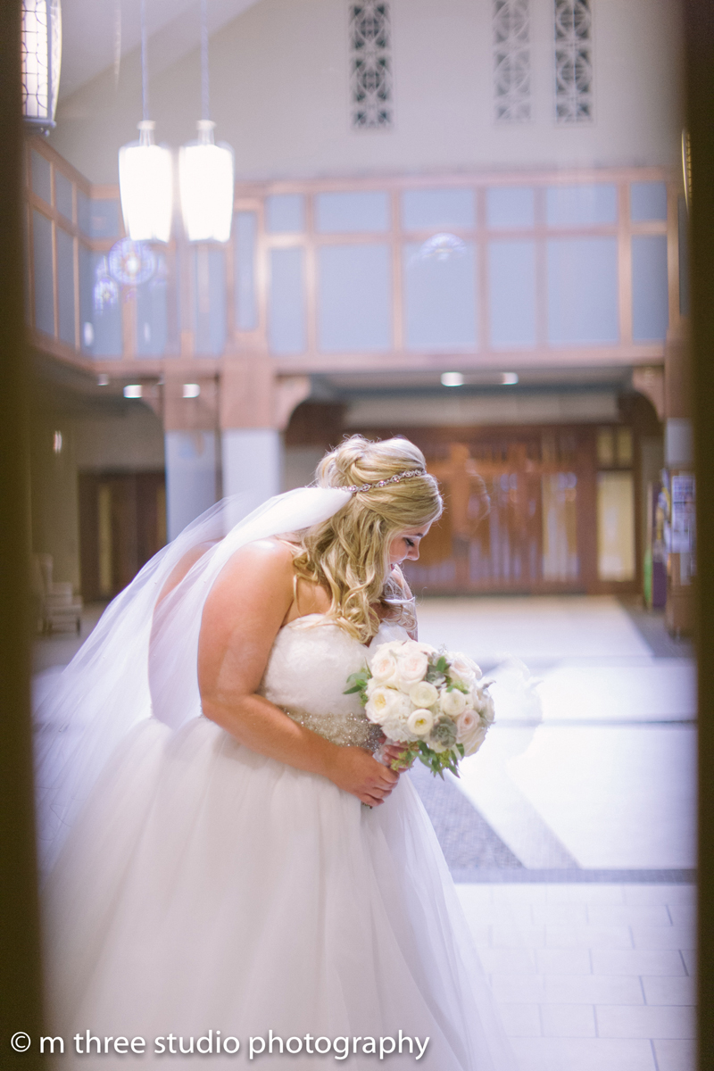 Anxiously Waiting Bride in Elegant Wedding Ceremony | The Majestic Vision Wedding Planning | St Jerome Catholic Church in Milwaukee, WI | www.themajesticvision.com | M Three Studio